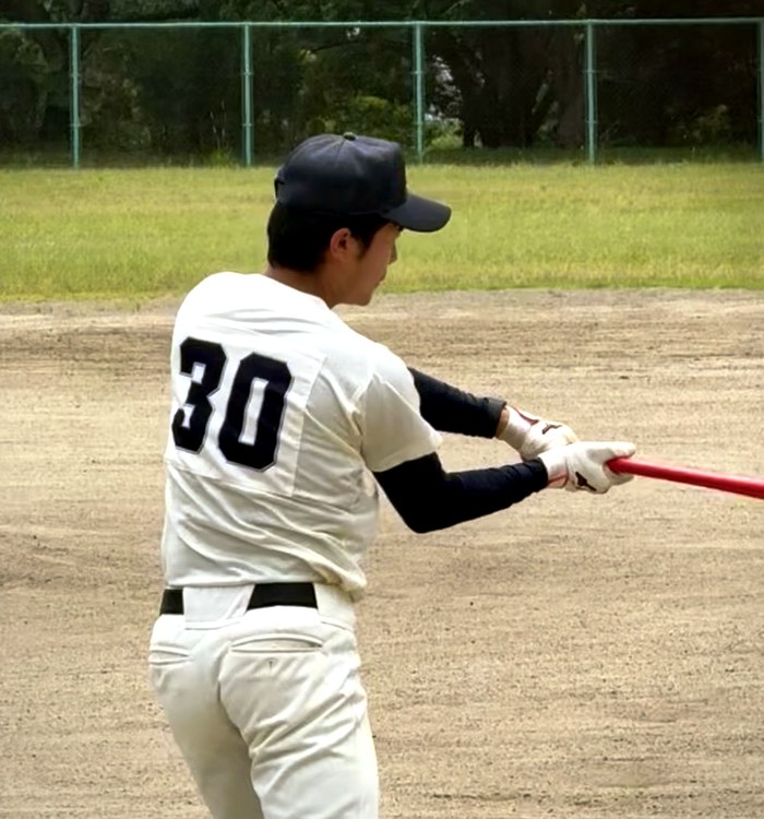 女子硬式野球部監督時代のやまさん(バッティング指導中)